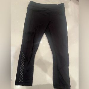 Lululemon Size 4 Cropped Black Leggings with Reflective checkered details